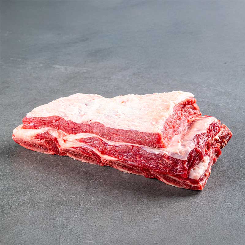 Premium Beef Ribs von TAURBULL, roh aus Black Angus Mutterkuhaufzucht, fotografiert von oben.