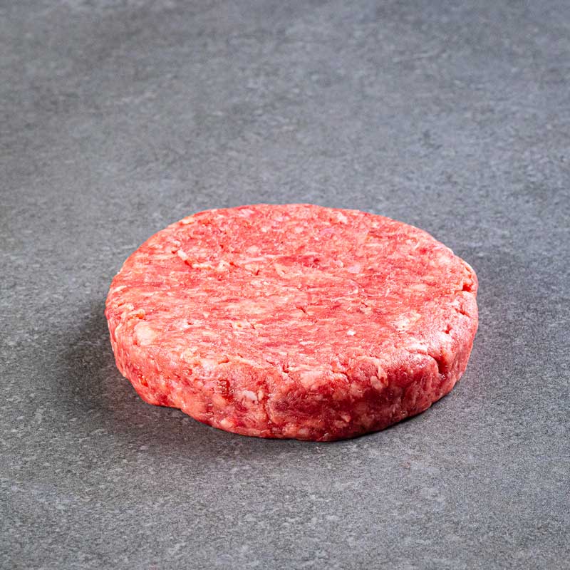 Premium Burger Patties von TAURBULL Black Angus, roh, Fleisch und Fett gemischt, ideal für saftige Burger.