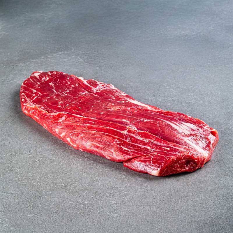 Premium Black Angus Flank Steak von TAURBULL, Bauchlappen, roh, aromatisch und saftig.