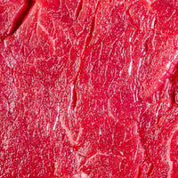 Nahaufnahme ganzes Filet vom Black Angus Rind von TAURBULL,ngus, roh, Draufsicht zeigt die hohe Qualität und zarte, gleichmäßige Struktur