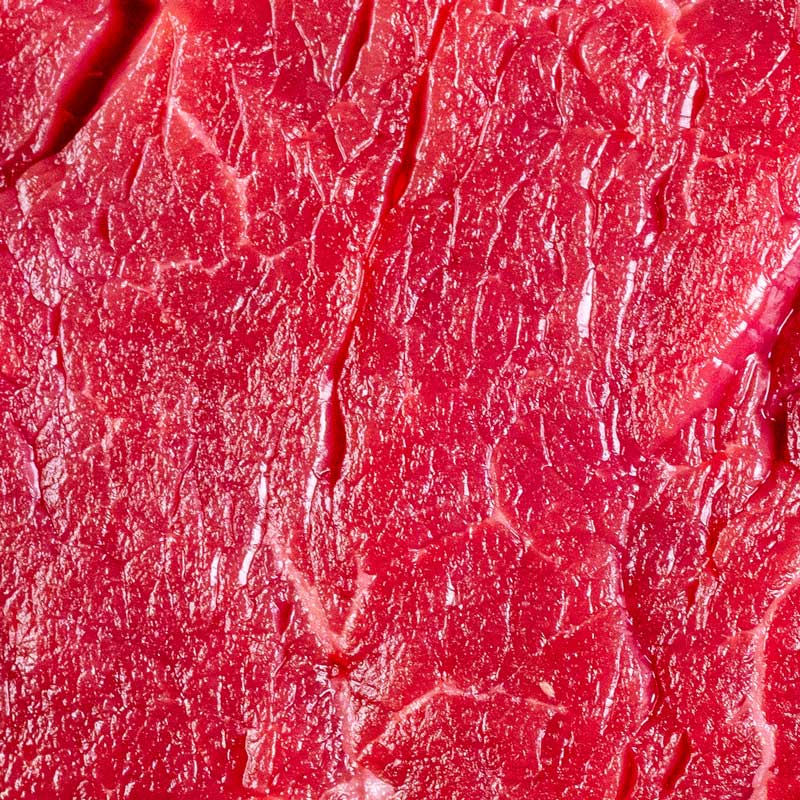 Nahaufnahme ganzes Filet vom Black Angus Rind von TAURBULL,ngus, roh, Draufsicht zeigt die hohe Qualität und zarte, gleichmäßige Struktur