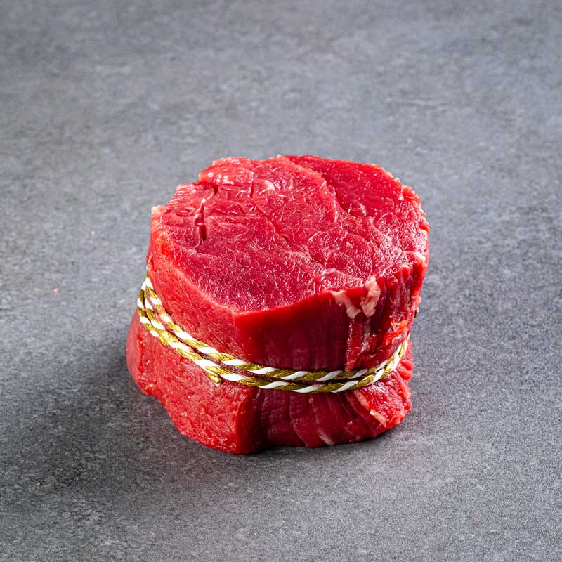 Zartes Filetsteak von TAURBULL, Premium Black Angus, roh, Draufsicht zeigt die gleichmäßige Textur.